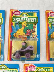 MaxSold Auction: Five vintage 1980s Sesame Street toys in original packaging - Vallejo (California, USA) SELLER MANAGED Estate Sale Online Auction - Georgia Street