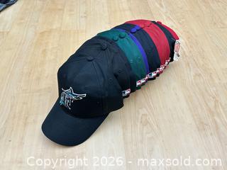 MaxSold Auction: Lots of 13 never-worn sports hats - Vallejo (California, USA) SELLER MANAGED Estate Sale Online Auction - Georgia Street