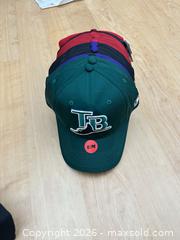 MaxSold Auction: Lots of 13 never-worn sports hats - Vallejo (California, USA) SELLER MANAGED Estate Sale Online Auction - Georgia Street