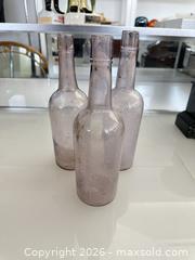 MaxSold Auction: Three vintage/antique purple glass bottles - Vallejo (California, USA) SELLER MANAGED Estate Sale Online Auction - Georgia Street