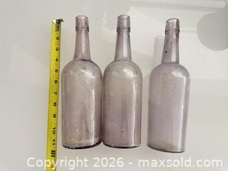 MaxSold Auction: Three vintage/antique purple glass bottles - Vallejo (California, USA) SELLER MANAGED Estate Sale Online Auction - Georgia Street