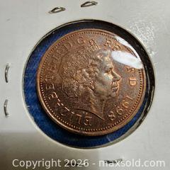 MaxSold Auction: 1999 Two pence Coin. - Leeds And The Thousand Islands (Ontario, Canada) SELLER MANAGED Downsizing Online Auction - Prince Street