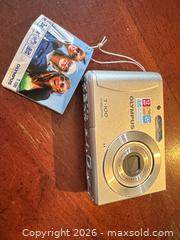 MaxSold Auction: Olympus T-100 12MP Point & Shoot Camera - Vancouver (British Columbia, Canada) SELLER MANAGED Downsizing Online Auction - Ortona Crescent