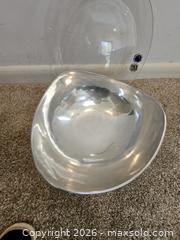 MaxSold Auction: Decorative Metal Bowl & Clear Acrylic Round Charger — 2-Piece Lot - Virginia Beach (Virginia, USA) SELLER MANAGED Downsizing Online Auction - Beachview Drive