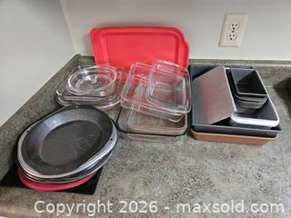 MaxSold Auction: Mixed bakeware & cookware lot - glass dishes, metal pans, silicone lids - Virginia Beach (Virginia, USA) SELLER MANAGED Downsizing Online Auction - Beachview Drive