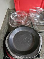 MaxSold Auction: Mixed bakeware & cookware lot - glass dishes, metal pans, silicone lids - Virginia Beach (Virginia, USA) SELLER MANAGED Downsizing Online Auction - Beachview Drive
