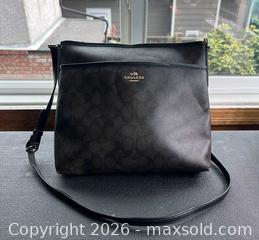 MaxSold Auction: Coach Signature 'C' Coated Canvas File Crossbody Shoulder Bag - New Westminster (British Columbia, Canada) SELLER MANAGED Downsizing Online Auction - Hamilton Street