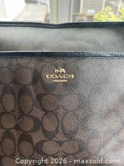 MaxSold Auction: Coach Signature 'C' Coated Canvas File Crossbody Shoulder Bag - New Westminster (British Columbia, Canada) SELLER MANAGED Downsizing Online Auction - Hamilton Street