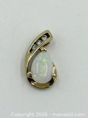 MaxSold Auction: 10k Gold Diamond & Opal Pendant 1.52 Grams - Esquimalt (British Columbia, Canada) PARTNER MANAGED Estate Sale Online Auction - Lampson Street