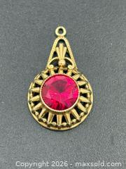 MaxSold Auction: 10k Gold & Ruby Pendant 1.38 Grams - Esquimalt (British Columbia, Canada) PARTNER MANAGED Estate Sale Online Auction - Lampson Street