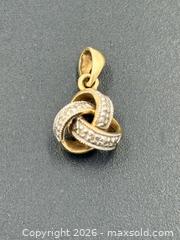 MaxSold Auction: 14k Gold and Diamond Pendant 1.16g - Esquimalt (British Columbia, Canada) PARTNER MANAGED Estate Sale Online Auction - Lampson Street