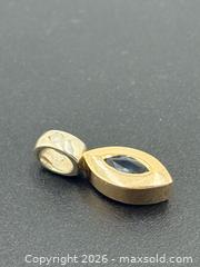 MaxSold Auction: 14k Gold Sapphire and Diamond Pendant 1.06g - Esquimalt (British Columbia, Canada) PARTNER MANAGED Estate Sale Online Auction - Lampson Street