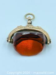 MaxSold Auction: 9ct Gold Amber Spinner Watch Fob Stamped 375 “P”  4.10 Grams - Esquimalt (British Columbia, Canada) PARTNER MANAGED Estate Sale Online Auction - Lampson Street
