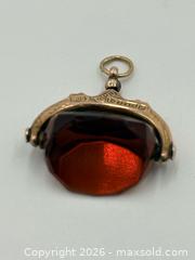 MaxSold Auction: 9ct Gold Amber Spinner Watch Fob Stamped 375 “P”  4.10 Grams - Esquimalt (British Columbia, Canada) PARTNER MANAGED Estate Sale Online Auction - Lampson Street