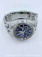 MaxSold Auction: Citizen Eco-Drive Calibre 8651 moon phase watch with a blue dial and stainless steel bracelet - Esquimalt (British Columbia, Canada) PARTNER MANAGED Estate Sale Online Auction - Lampson Street