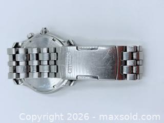 MaxSold Auction: Citizen Eco-Drive Calibre 8651 moon phase watch with a blue dial and stainless steel bracelet - Esquimalt (British Columbia, Canada) PARTNER MANAGED Estate Sale Online Auction - Lampson Street