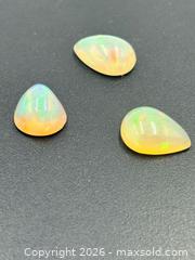 MaxSold Auction: Ethiopian Opal Cabochons 4.05 Carats  - Esquimalt (British Columbia, Canada) PARTNER MANAGED Estate Sale Online Auction - Lampson Street