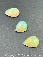 MaxSold Auction: Ethiopian Opal Cabochons 4.05 Carats  - Esquimalt (British Columbia, Canada) PARTNER MANAGED Estate Sale Online Auction - Lampson Street