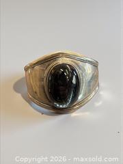 MaxSold Auction: Massive Sterling Silver Obsidian Cuff Bracelet 57.3 Grams - Esquimalt (British Columbia, Canada) PARTNER MANAGED Estate Sale Online Auction - Lampson Street