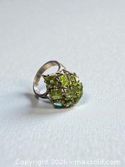 MaxSold Auction: Sterling Silver Peridot Cluster Ring Size 7 6.94 Grams - Esquimalt (British Columbia, Canada) PARTNER MANAGED Estate Sale Online Auction - Lampson Street