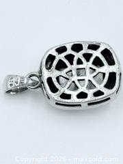 MaxSold Auction: Sterling Silver Topaz Pendant  - Esquimalt (British Columbia, Canada) PARTNER MANAGED Estate Sale Online Auction - Lampson Street