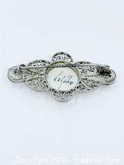 MaxSold Auction: Vintage Dutch Delft Blue and White Porcelain Windmill Brooch with a Silver Filigree Setting - Esquimalt (British Columbia, Canada) PARTNER MANAGED Estate Sale Online Auction - Lampson Street