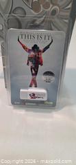 MaxSold Auction: Kingston 2GB USB Flash Drive — Michael Jackson This Is It - San Jose (California, USA) SELLER MANAGED Downsizing Online Auction - North 24th Street