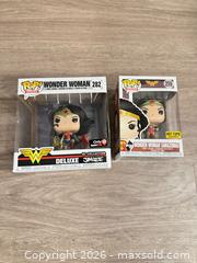 MaxSold Auction: 2 Funko Pop! (Pop! Heroes) Vinyl Figures — Boxed - Douglasville (Georgia, USA) PARTNER MANAGED Downsizing Online Auction - Highway 92 - Fairburn Road (CONDO)