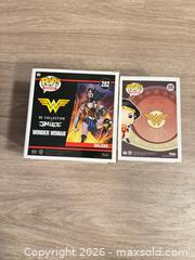 MaxSold Auction: 2 Funko Pop! (Pop! Heroes) Vinyl Figures — Boxed - Douglasville (Georgia, USA) PARTNER MANAGED Downsizing Online Auction - Highway 92 - Fairburn Road (CONDO)