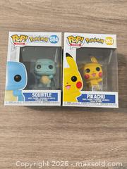 MaxSold Auction: Funko Pop! Games Pikachu #553 & Squirtle #504 (3.75 in) - Douglasville (Georgia, USA) PARTNER MANAGED Downsizing Online Auction - Highway 92 - Fairburn Road (CONDO)