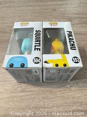 MaxSold Auction: Funko Pop! Games Pikachu #553 & Squirtle #504 (3.75 in) - Douglasville (Georgia, USA) PARTNER MANAGED Downsizing Online Auction - Highway 92 - Fairburn Road (CONDO)