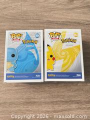 MaxSold Auction: Funko Pop! Games Pikachu #553 & Squirtle #504 (3.75 in) - Douglasville (Georgia, USA) PARTNER MANAGED Downsizing Online Auction - Highway 92 - Fairburn Road (CONDO)