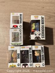 MaxSold Auction: Funko Pop! Lot — 6 Boxed Figures: Deadpool, Grogu, Freddy & More - Douglasville (Georgia, USA) PARTNER MANAGED Downsizing Online Auction - Highway 92 - Fairburn Road (CONDO)
