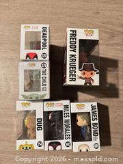 MaxSold Auction: Funko Pop! Lot — 6 Boxed Figures: Deadpool, Grogu, Freddy & More - Douglasville (Georgia, USA) PARTNER MANAGED Downsizing Online Auction - Highway 92 - Fairburn Road (CONDO)
