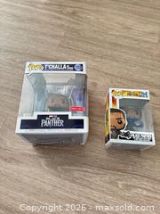 MaxSold Auction: Funko Pop! Marvel Black Panther Lot (2) - Douglasville (Georgia, USA) PARTNER MANAGED Downsizing Online Auction - Highway 92 - Fairburn Road (CONDO)