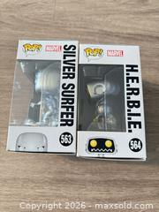MaxSold Auction: Funko Pop! Marvel Fantastic Four H.E.R.B.I.E. & Silver Surfer (2) - Douglasville (Georgia, USA) PARTNER MANAGED Downsizing Online Auction - Highway 92 - Fairburn Road (CONDO)