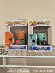 MaxSold Auction: Funko Pop! Pokémon Charmander #455 & Bulbasaur #453 Vinyl - Douglasville (Georgia, USA) PARTNER MANAGED Downsizing Online Auction - Highway 92 - Fairburn Road (CONDO)