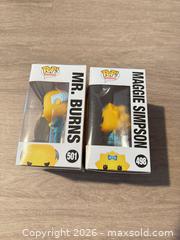 MaxSold Auction: Funko Pop! The Simpsons Maggie (498) & Mr. Burns (501) Vinyl Lot - Douglasville (Georgia, USA) PARTNER MANAGED Downsizing Online Auction - Highway 92 - Fairburn Road (CONDO)
