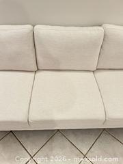 MaxSold Auction: Light Beige Three-Seat Sofa, 83" W x 32" D x 32" H - Toronto (Ontario, Canada) PARTNER MANAGED Downsizing Online Auction - Creekwood Drive