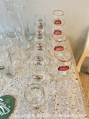 MaxSold Auction: Mixed Beer Glassware & Coaster Lot — Approx. 22 Pieces - Toronto (Ontario, Canada) PARTNER MANAGED Downsizing Online Auction - Creekwood Drive