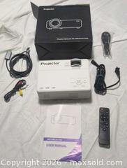 MaxSold Auction: Projector  - Gloucester (Massachusetts, USA) SELLER MANAGED Downsizing Online Auction -  Fremont Street