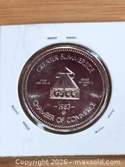 MaxSold Auction: Unc Trade Dollar Canada in 2x2 Flio - Battersea (Ontario, Canada) SELLER MANAGED Downsizing Online Auction - Battersea Road