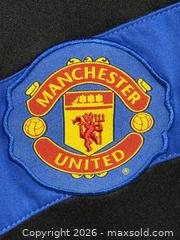 MaxSold Auction: Vintage Nike 2009/2010 Manchester United Soccer Football Jersey  - Ottawa (Ontario, Canada) SELLER MANAGED Downsizing Online Auction -  Prince Albert Street