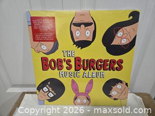 MaxSold Auction: Bob's Burgers The Movie vinyl record lot - Abbotsford (British Columbia, Canada) SELLER MANAGED Downsizing Online Auction - Auguston Parkway South                 