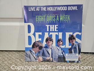 MaxSold Auction: The Beatles Eight Days a Week vinyl record and George Harrison vinyl record - Abbotsford (British Columbia, Canada) SELLER MANAGED Downsizing Online Auction - Auguston Parkway South                 