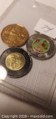 MaxSold Auction: Cdn dollar coin and 2 toonies  - Haldimand (Ontario, Canada) SELLER MANAGED Downsizing Online Auction - Ramsey Drive