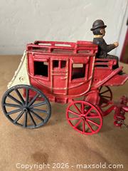 MaxSold Auction: Vintage Cast Iron Red Stagecoach with Driver - Glendale (California, USA) SELLER MANAGED Moving Online Auction - West Dryden Street