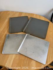 MaxSold Auction: Set of Four Cookie Sheets with Air Insulation Layered Design - Kingston (Ontario, Canada) SELLER MANAGED Downsizing Online Auction - Bishop Street