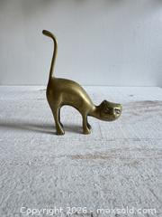MaxSold Auction: Vintage Playful Tail Up Brass Cat - Brass Cat Figure Statue - Vintage Brass Cat Ring Holder - Made in India - Kingston (Ontario, Canada) SELLER MANAGED Downsizing Online Auction - Bishop Street