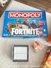 MaxSold Auction: Lot of 8 Board Games — Monopoly Fortnite, Jenga & More - Oshawa (Ontario, Canada) SELLER MANAGED Reseller Online Auction - Skylark Avenue